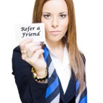 if_post_2011-08_customer-referral-program Woman Holding Refer a Friend Card